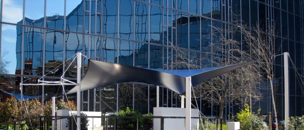 Double hypar tensile sail, London. Guyed powder coated mild steel posts by Alfresco365